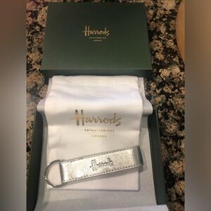 Harrods Silver metallic leather key ring.